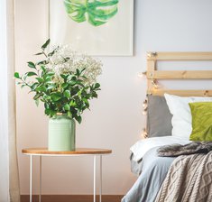 Flowers next to bed